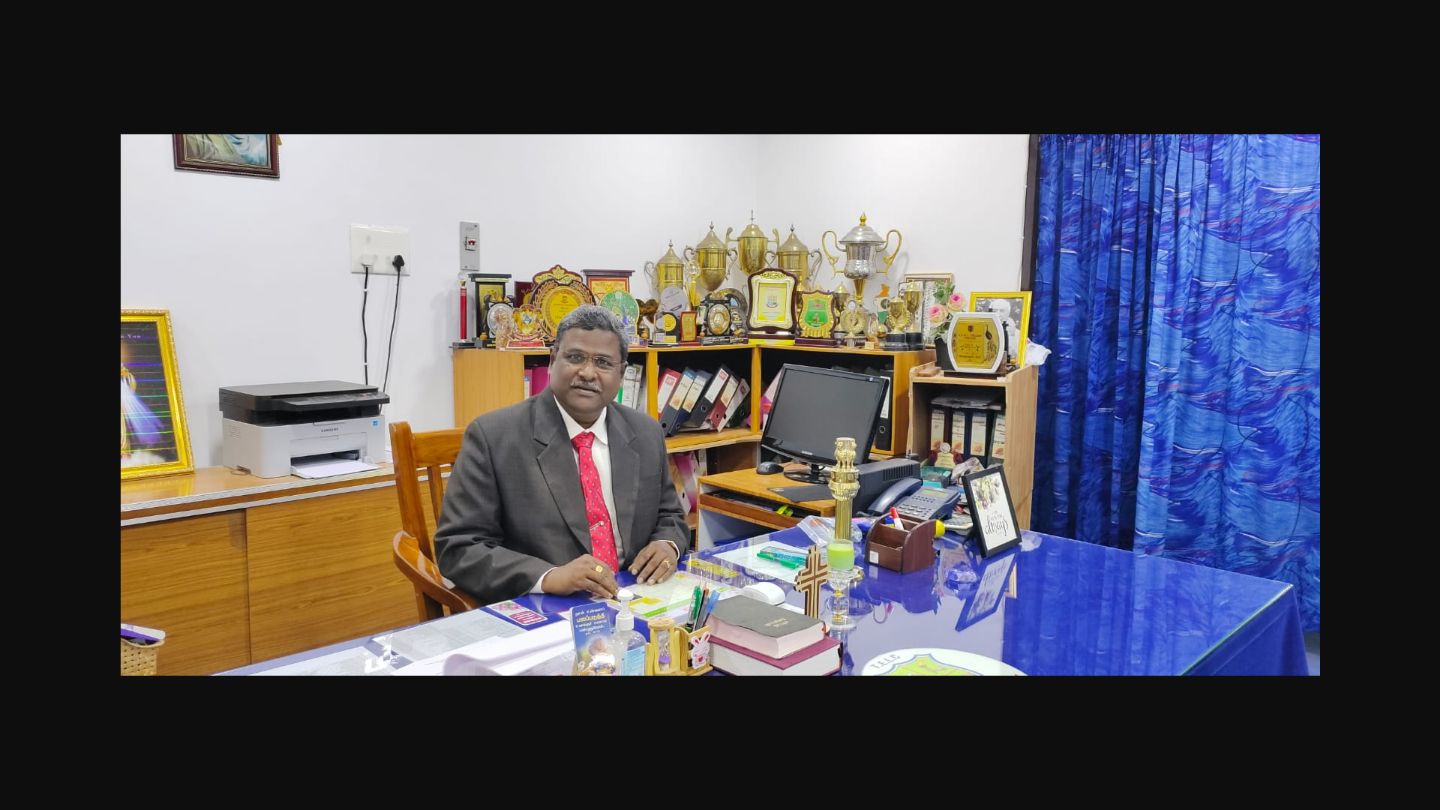 Dr. Johnson - Principal, TBML College